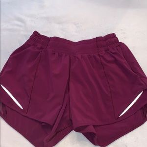 Purple lululemon shorts.